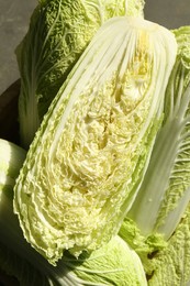 Fresh ripe Chinese cabbages on table, top view