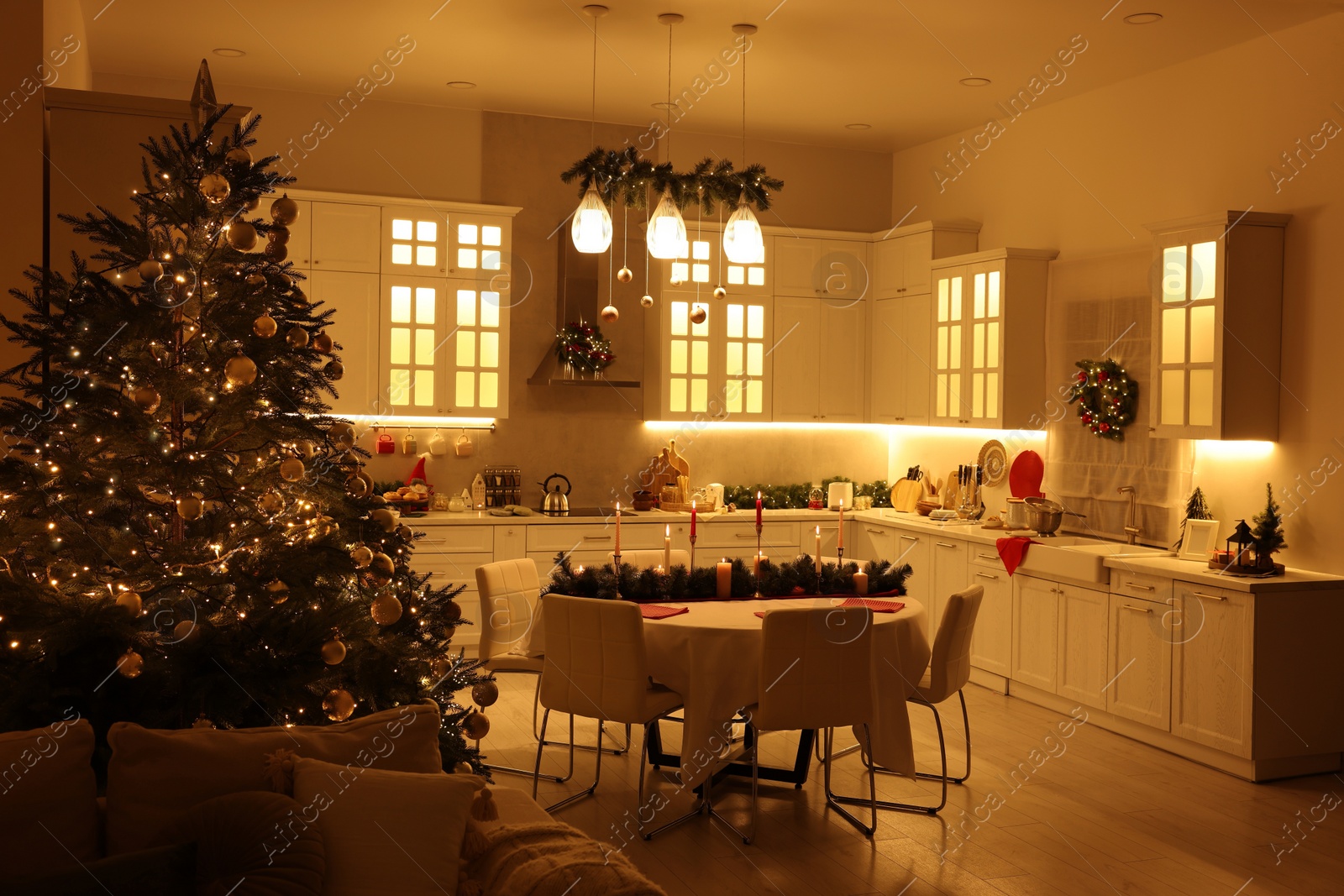 Photo of Cozy spacious kitchen decorated for Christmas. Interior design