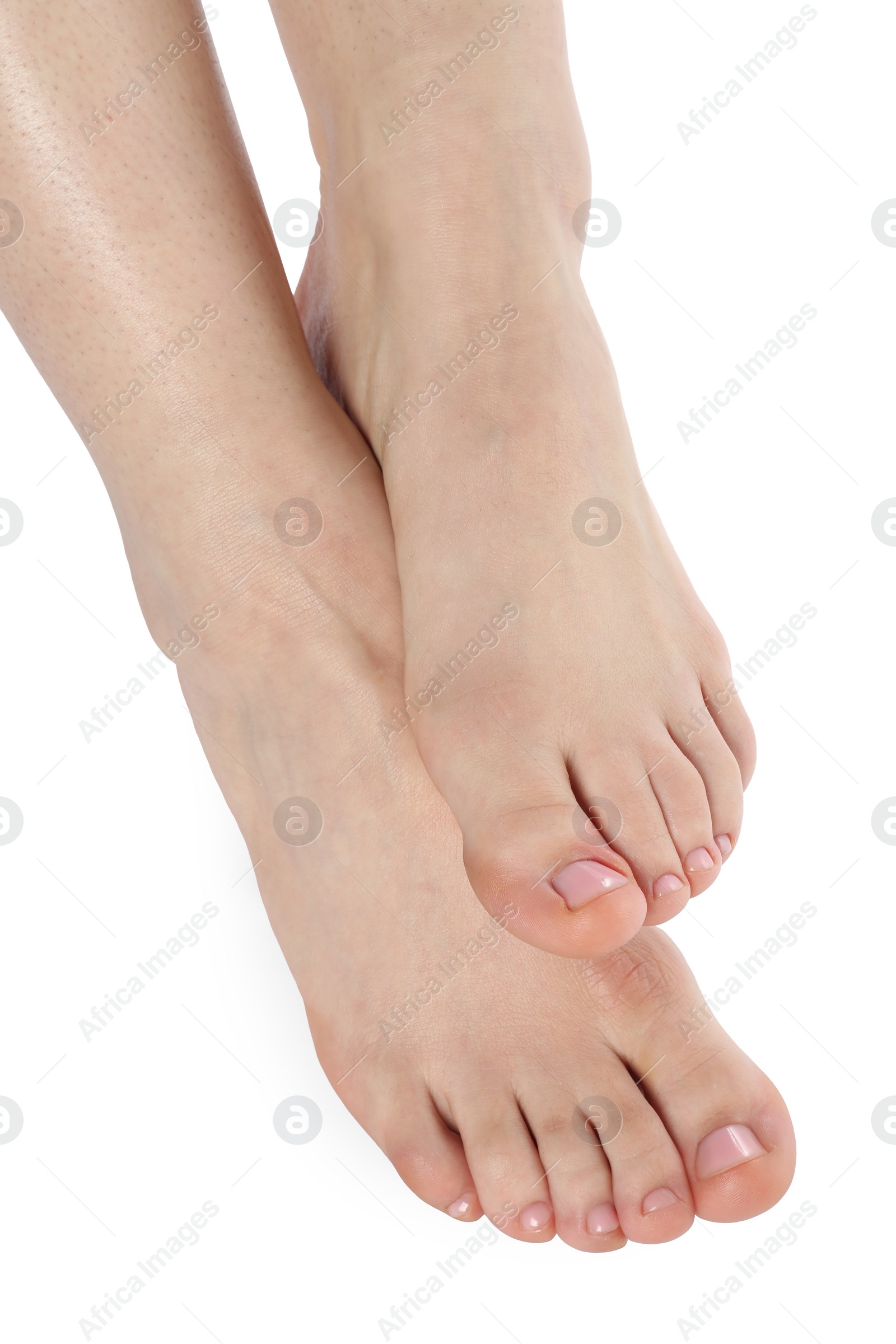 Photo of Woman with neat toenails after pedicure procedure isolated on white, closeup