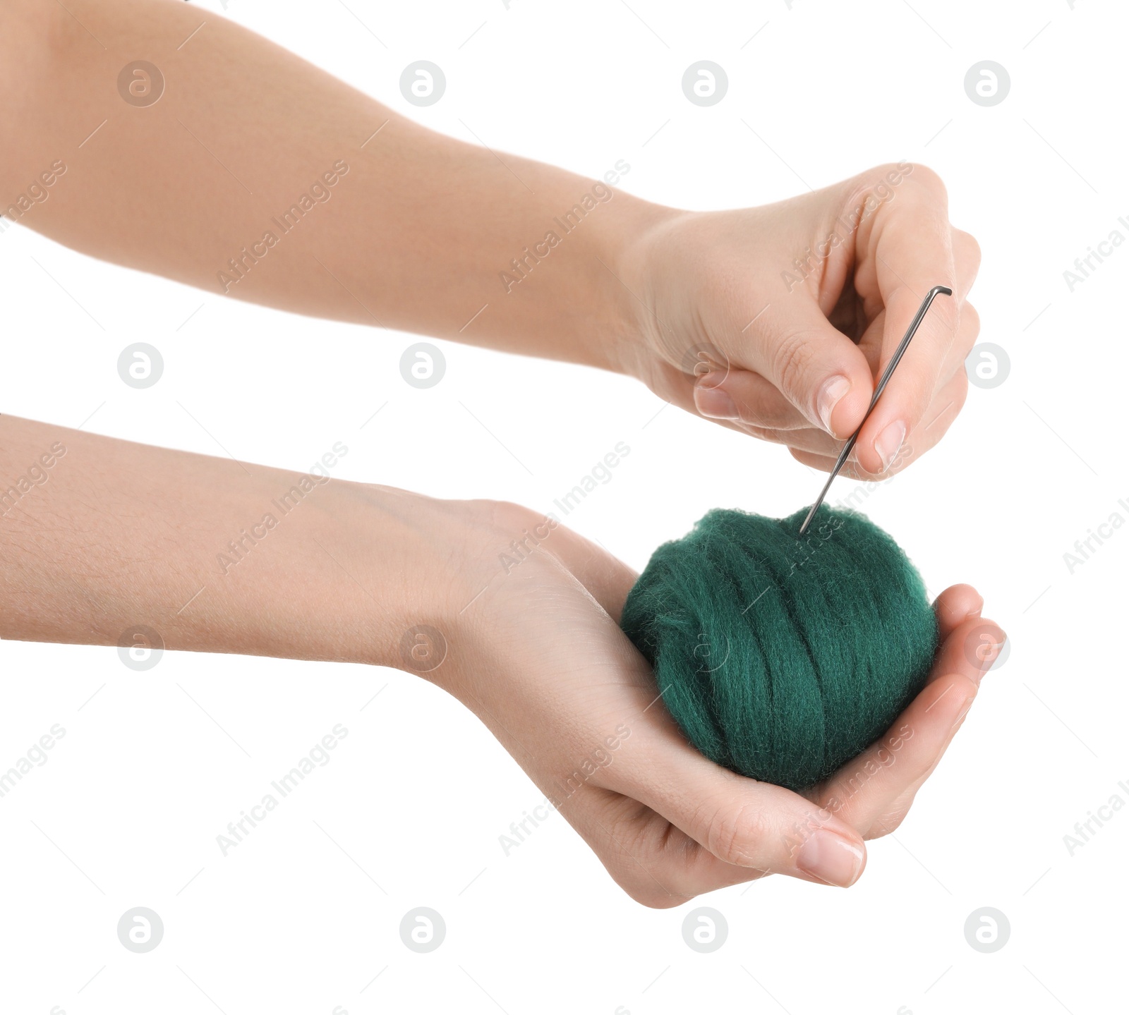 Photo of Woman needle felting from wool on white background, closeup