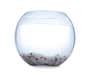 Glass fish bowl with clear water and decorative pebble isolated on white