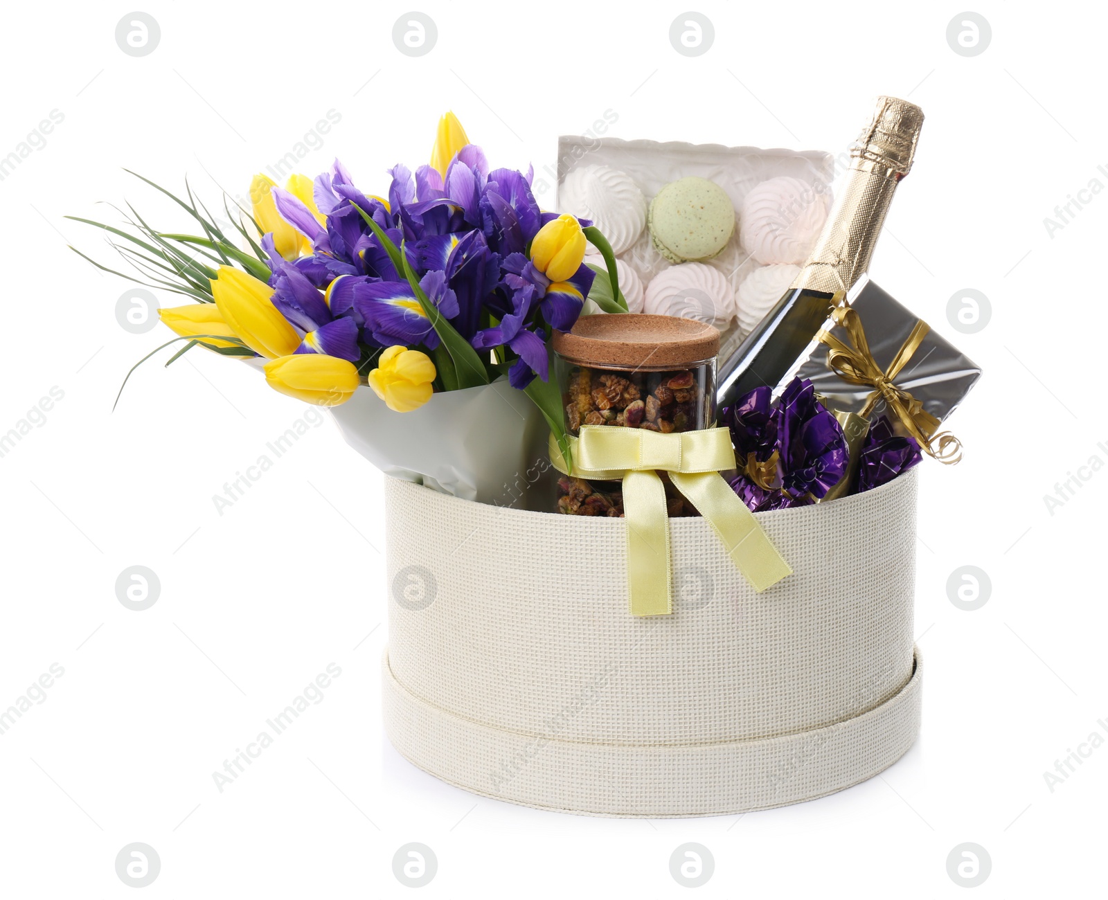 Photo of Basket with gifts, bouquet and champagne on white background