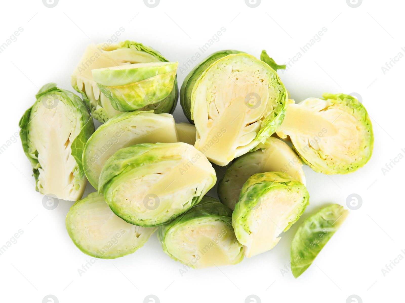 Photo of Pile of cut Brussels sprouts isolated on white, top view