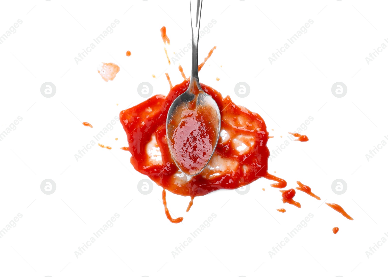 Photo of Spoon with tasty ketchup isolated on white, top view. Tomato sauce