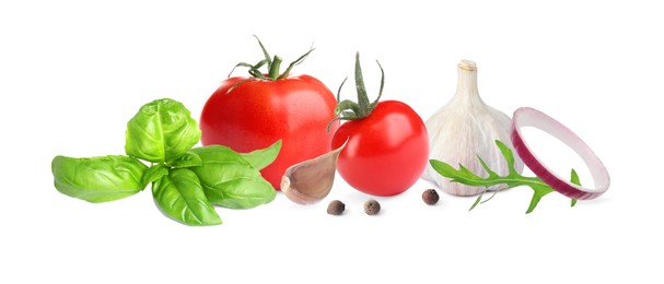 Image of Fresh ripe tomatoes with garlic, onion, basil, arugula and peppercorns on white background. Banner design