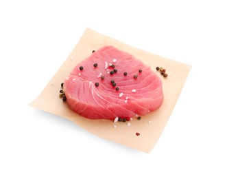 Photo of Raw tuna fillet with peppercorns on white background