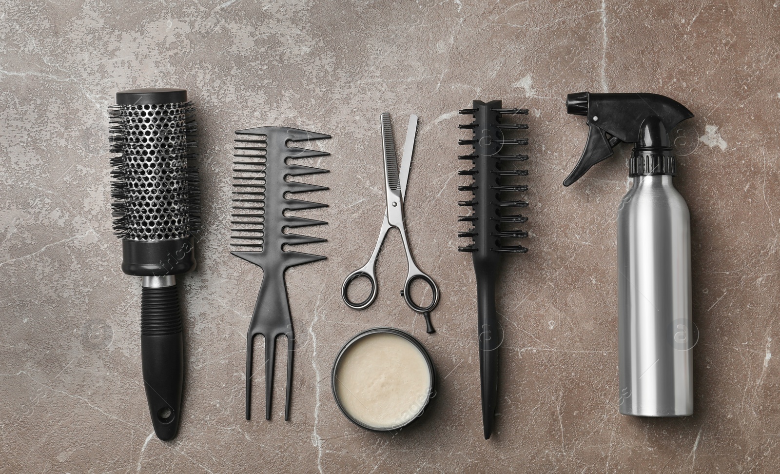 Photo of Professional hairdresser set on grey background