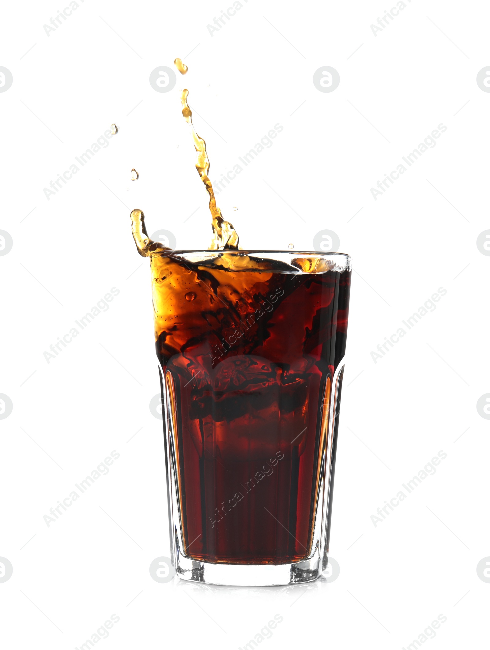 Photo of Splash of cola in glass on white background