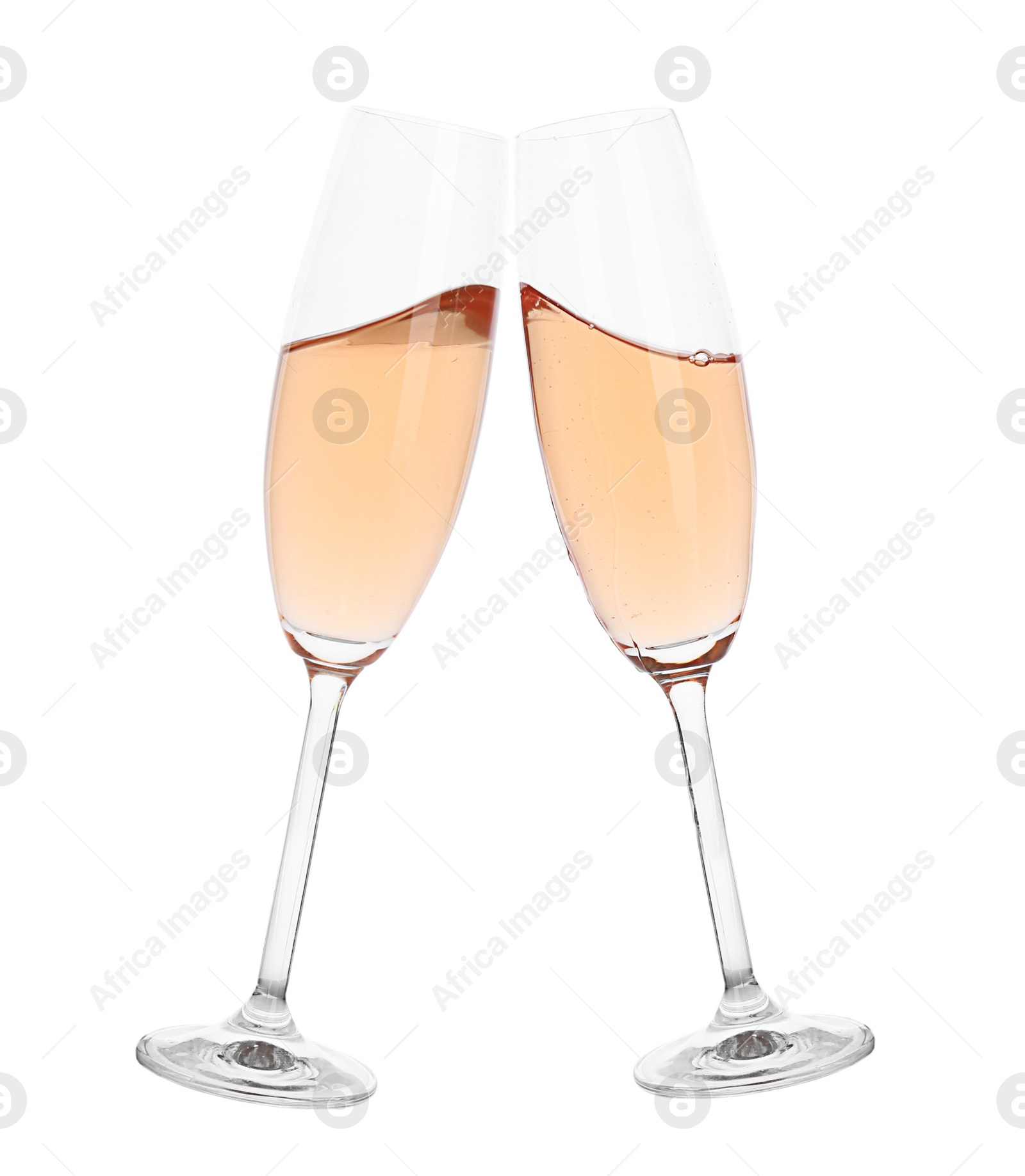 Photo of Toasting with glasses of rose champagne on white background