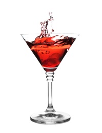 Glass of martini cocktail with splash on white background