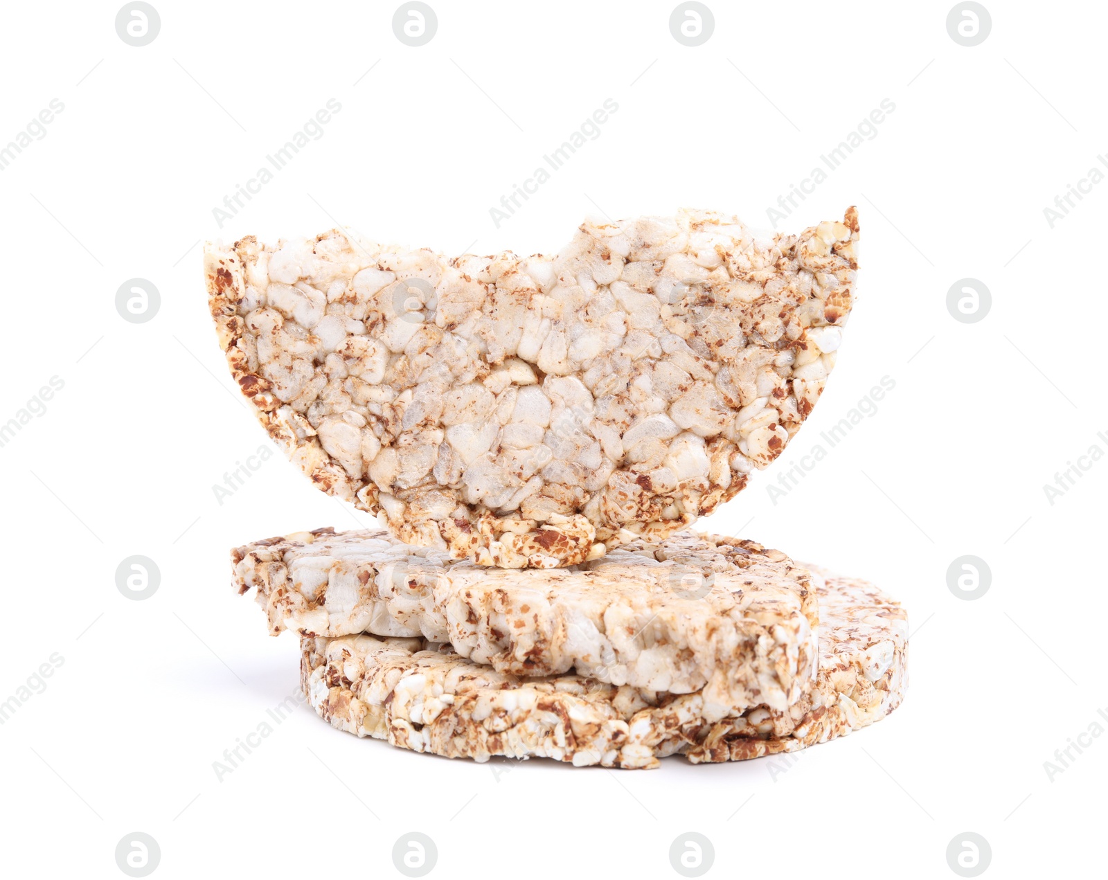 Photo of Tasty crunchy buckwheat cakes on white background