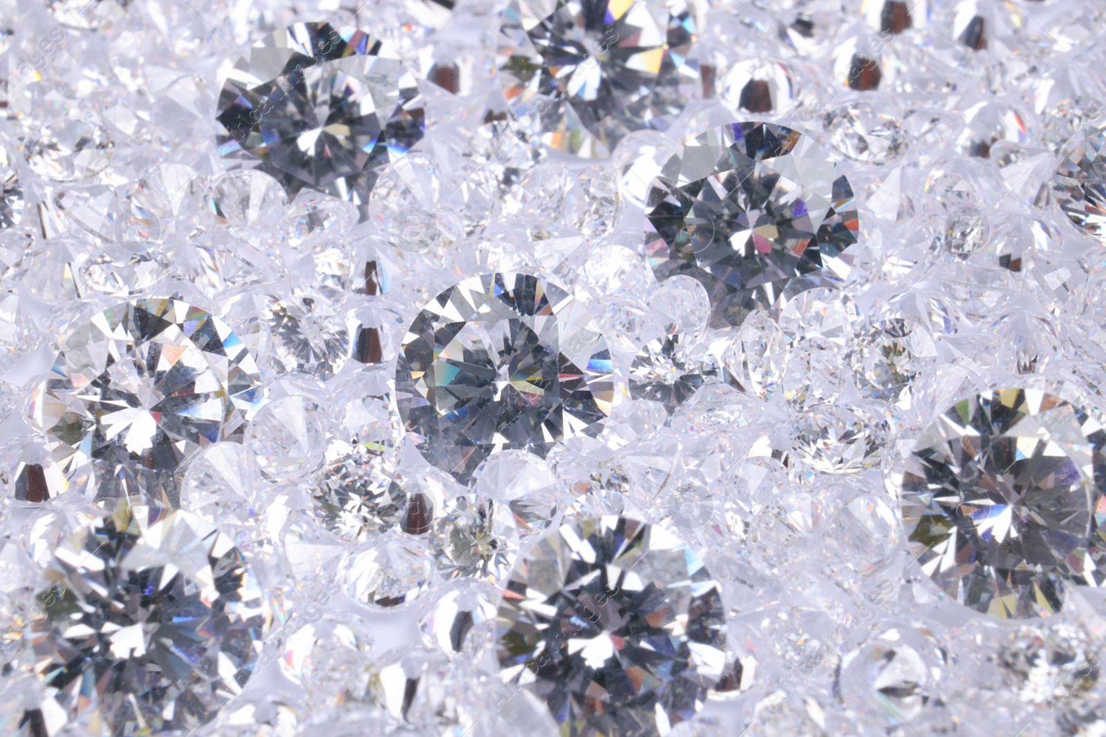 Photo of Many beautiful shiny diamonds as background, closeup