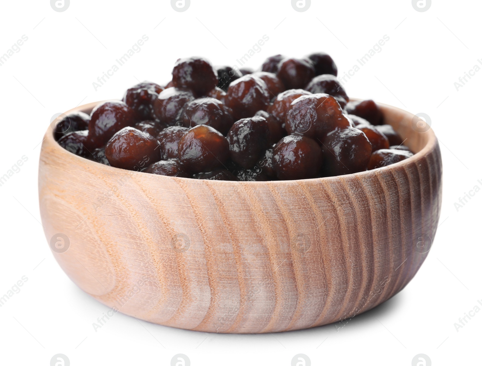 Photo of Tapioca balls for milk bubble tea in wooden bowl isolated on white