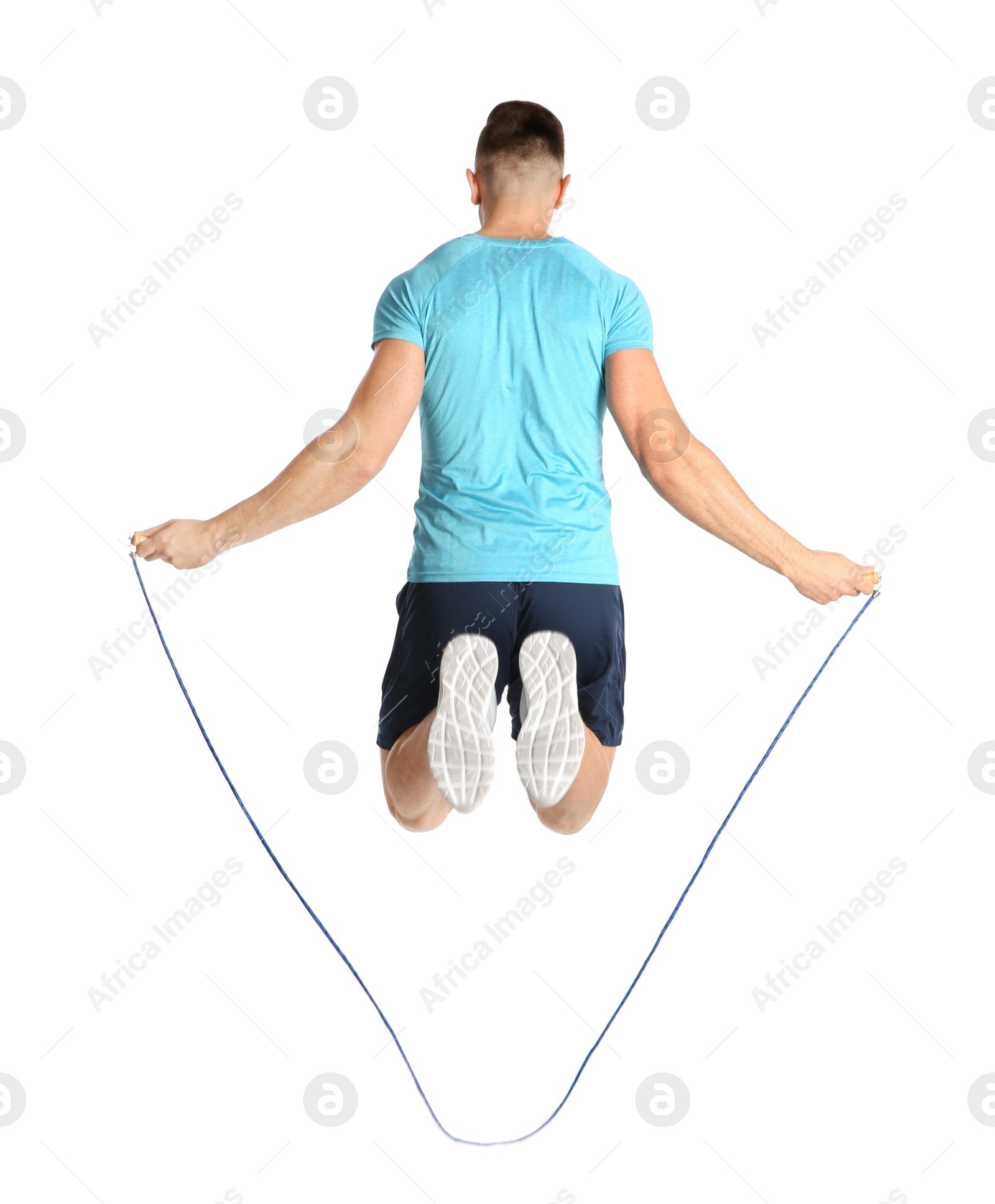 Photo of Sportive man training with jump rope on white background