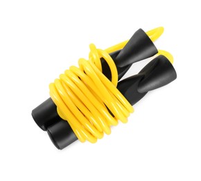 Photo of Yellow skipping rope on white background, top view. Sports equipment