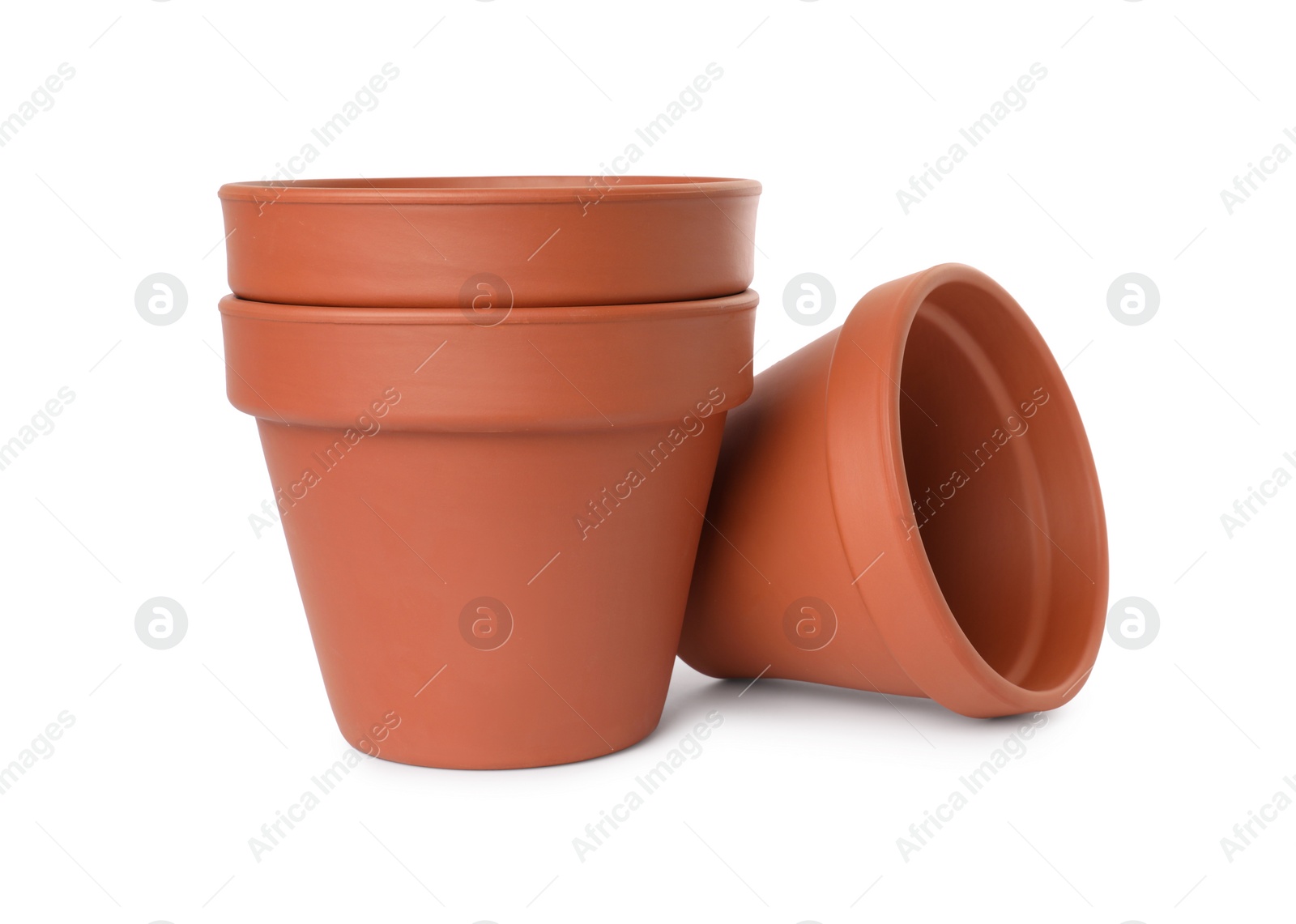 Photo of Empty clay flower pots isolated on white