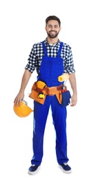 Full length portrait of construction worker with tool belt on white background