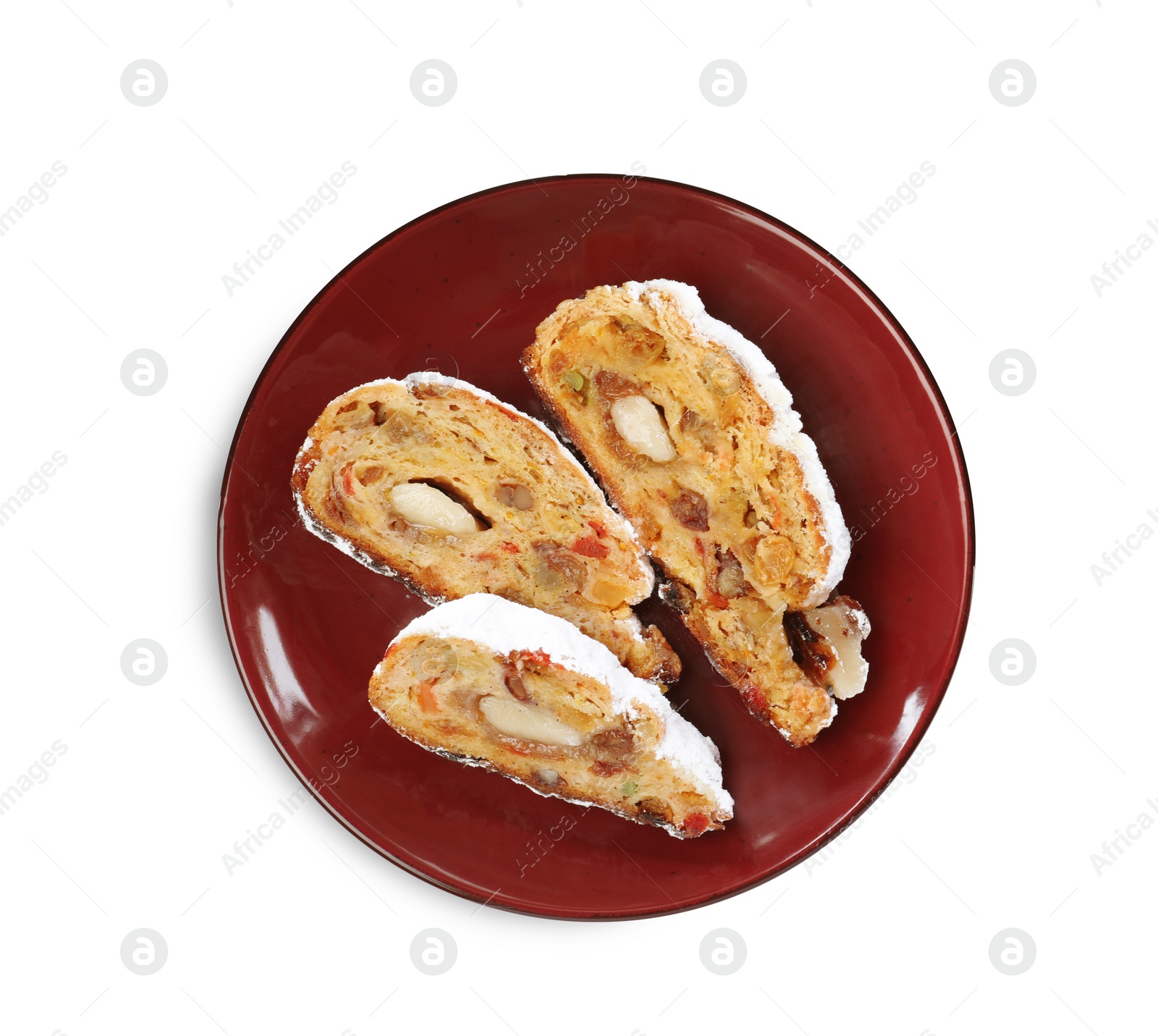 Photo of Traditional Christmas Stollen with icing sugar on white background, top view