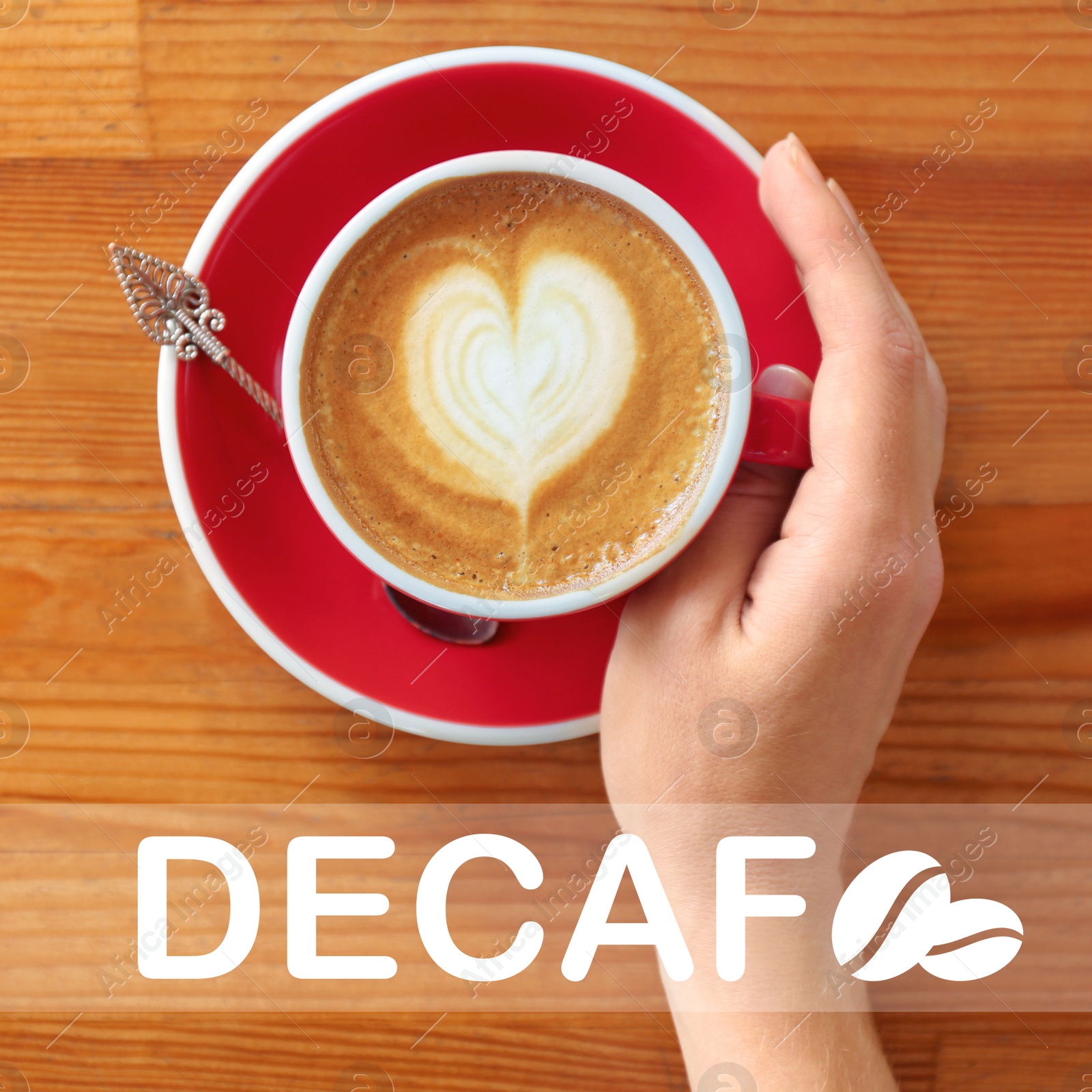 Image of Woman with cup of aromatic decaf coffee at wooden table, top view