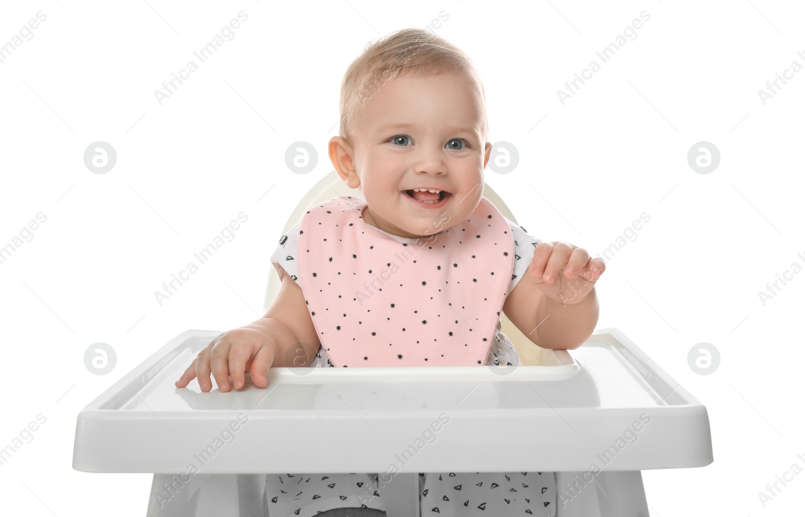 Photo of Cute little baby wearing bib in highchair on white background