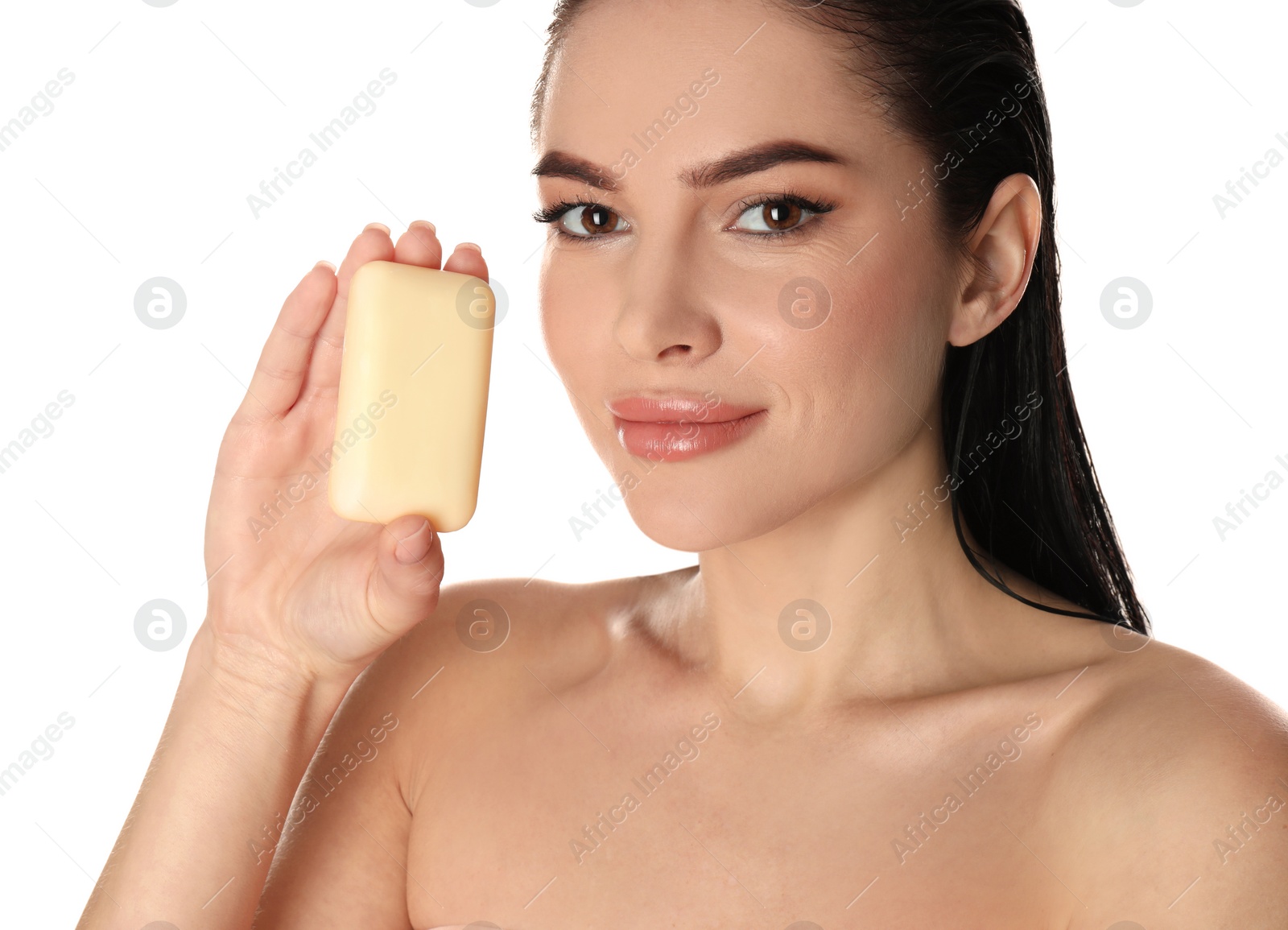 Photo of Young woman with soap bar on white background