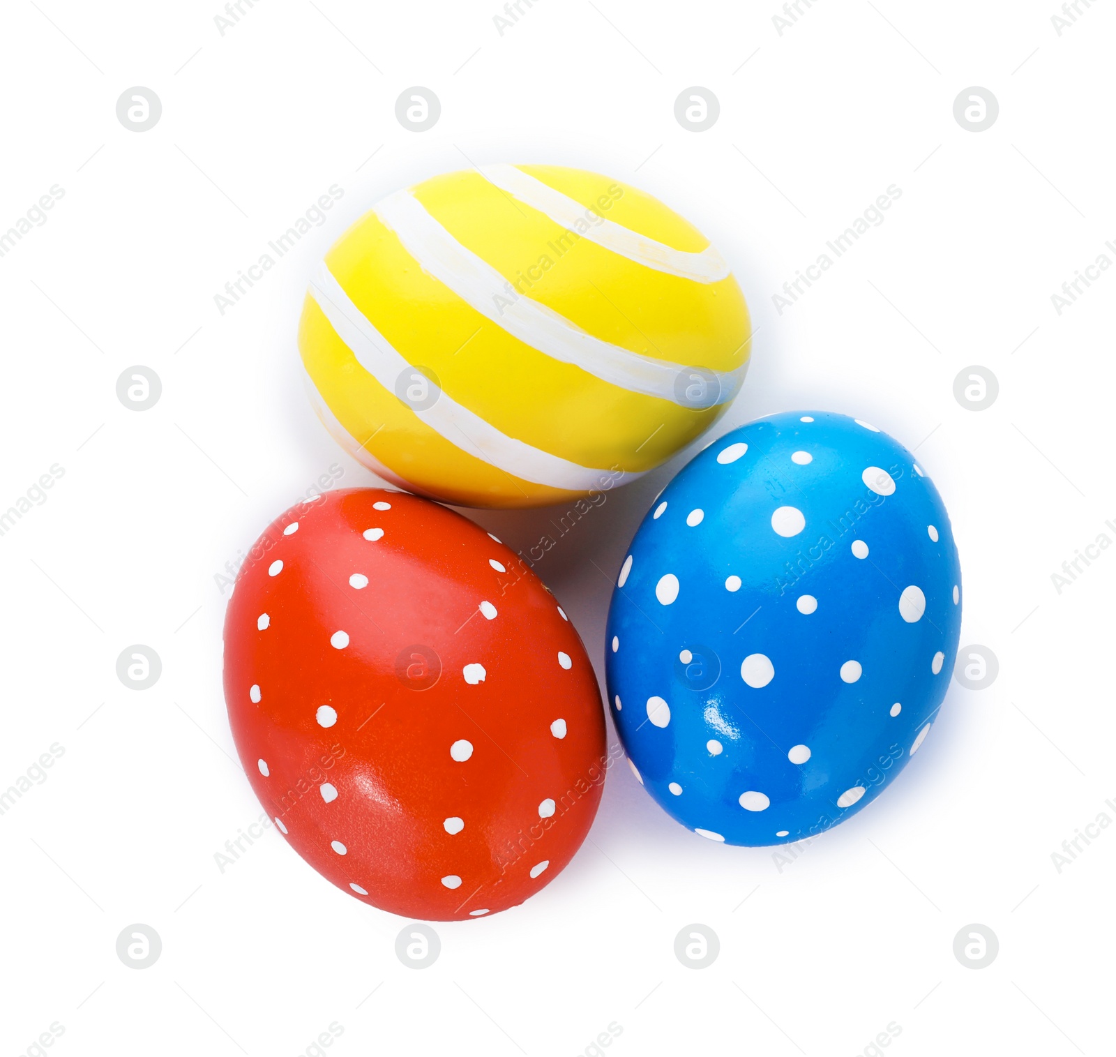 Photo of Decorated Easter eggs on white background, top view. Festive tradition