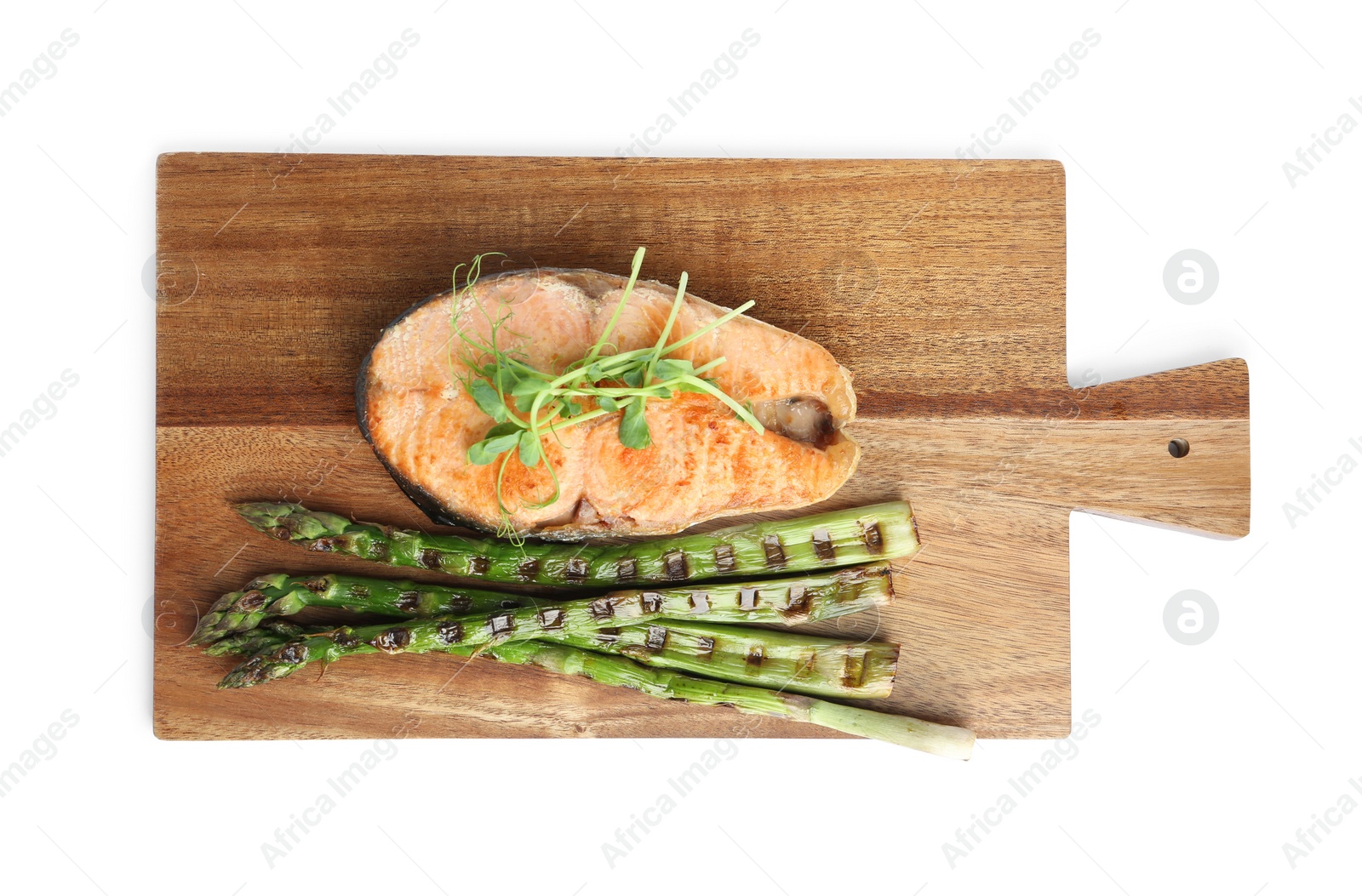 Photo of Tasty salmon steak with asparagus and sprouts isolated on white, top view