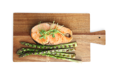 Photo of Tasty salmon steak with asparagus and sprouts isolated on white, top view