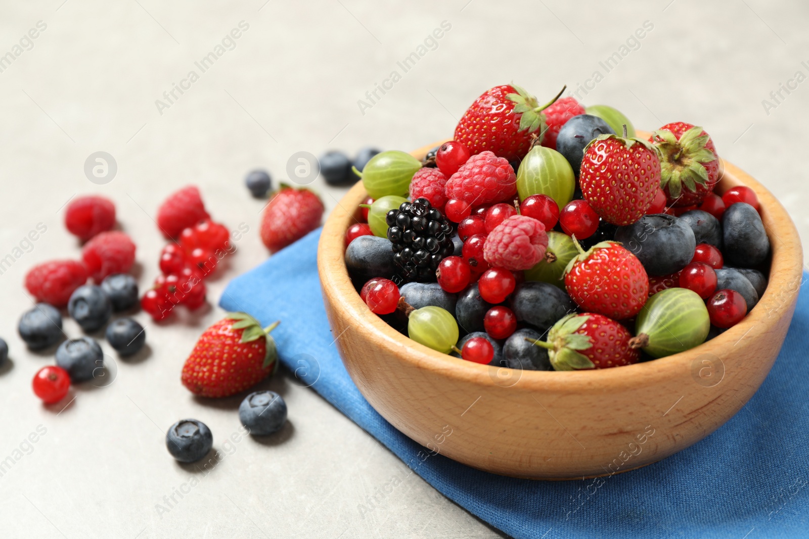 Photo of Mix of ripe berries on light table