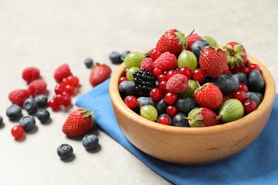 Mix of ripe berries on light table