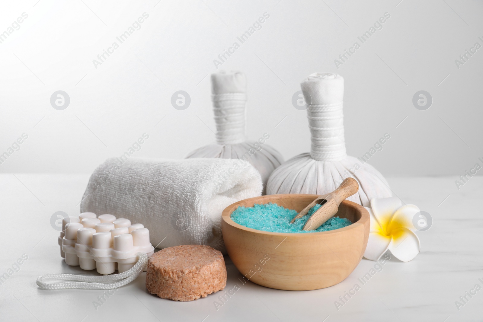 Photo of Spa composition with care products on white marble table