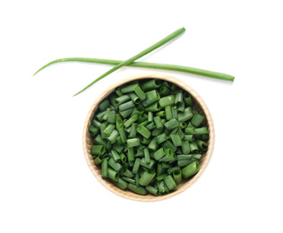 Cut green spring onion in wooden bowl isolated on white, top view