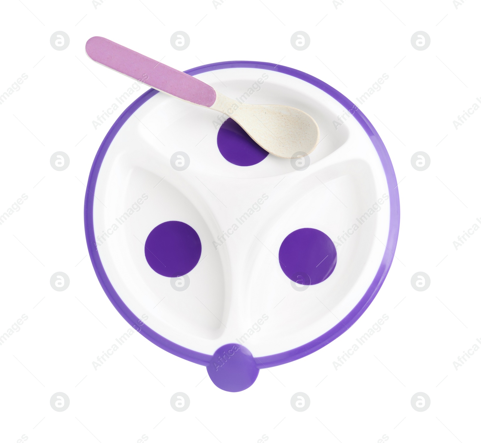 Photo of Plastic section plate with spoon isolated on white, top view. Serving baby food