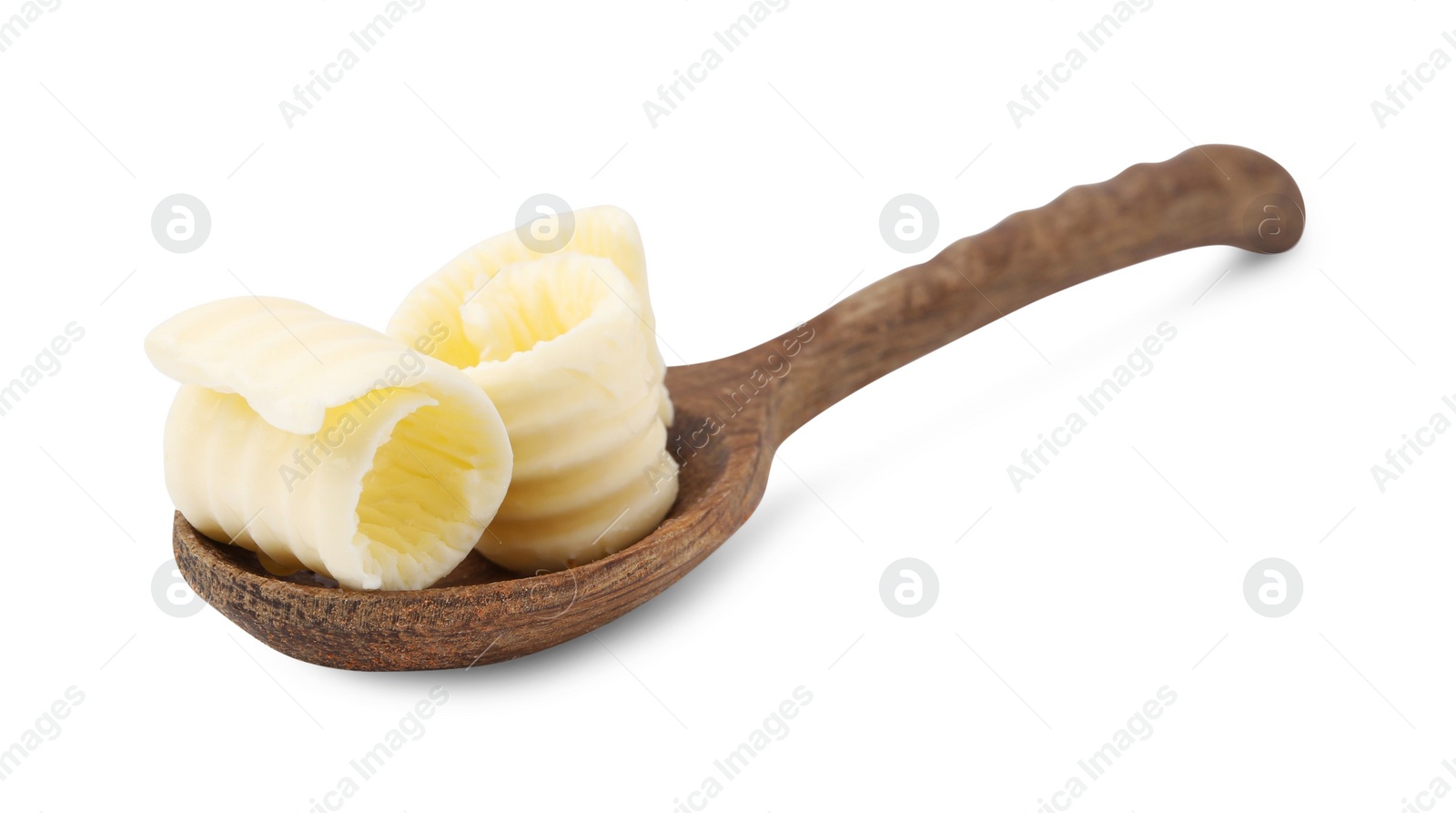 Photo of Tasty butter curls in spoon isolated on white