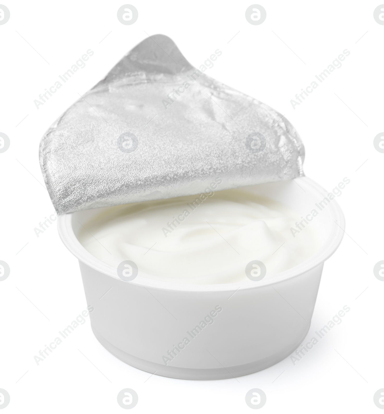 Photo of Delicious natural yogurt in plastic cup isolated on white