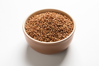 Photo of Bowl with buckwheat on white background. Natural food high in protein