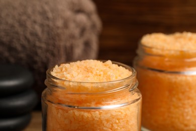 Photo of Jars with orange sea salt, closeup view
