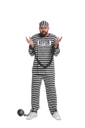 Photo of Prisoner in special uniform with chained hands and metal ball on white background