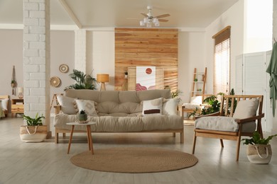 Photo of Spacious room interior with stylish wooden furniture. Idea for design