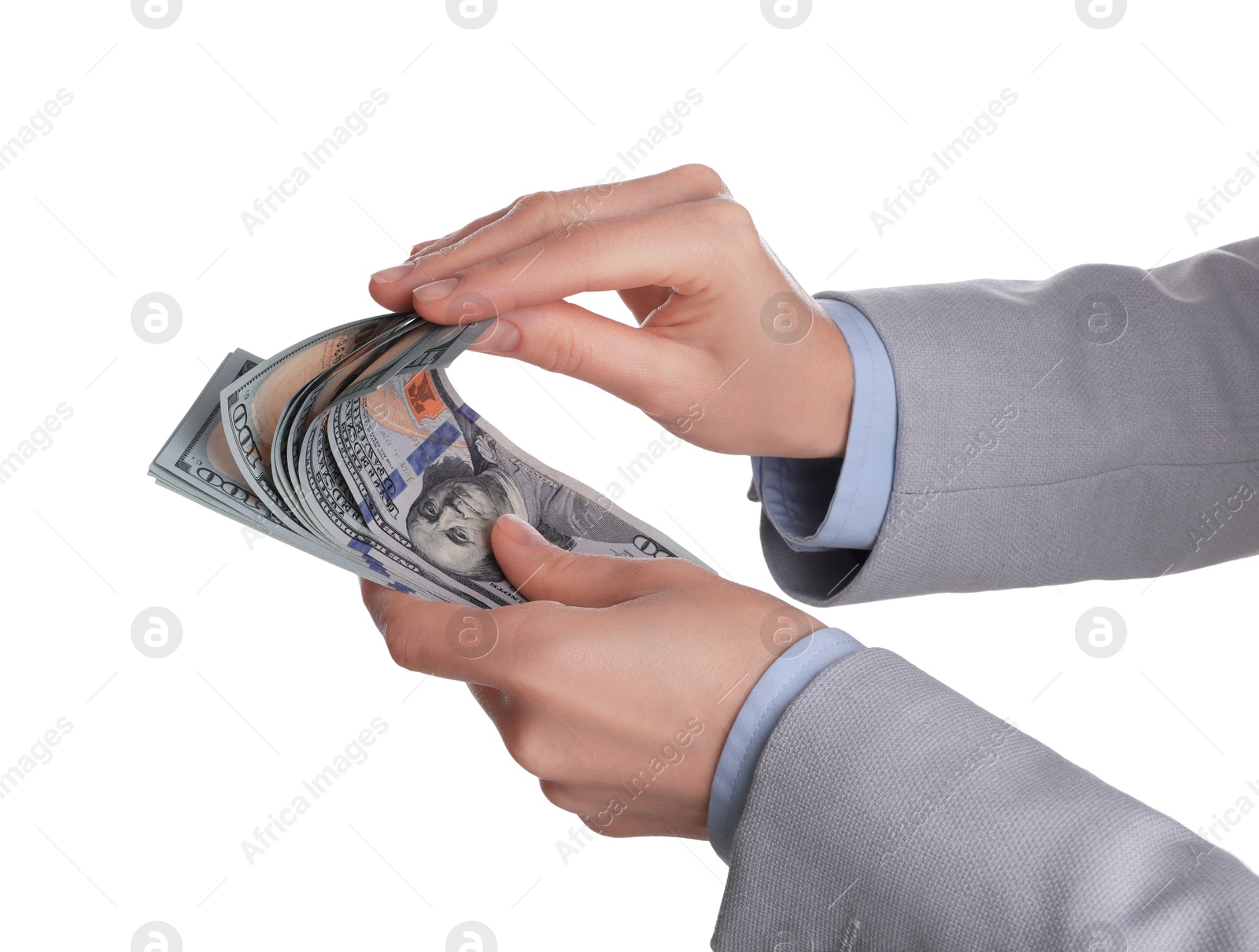 Photo of Money exchange. Woman counting dollar banknotes on white background, closeup