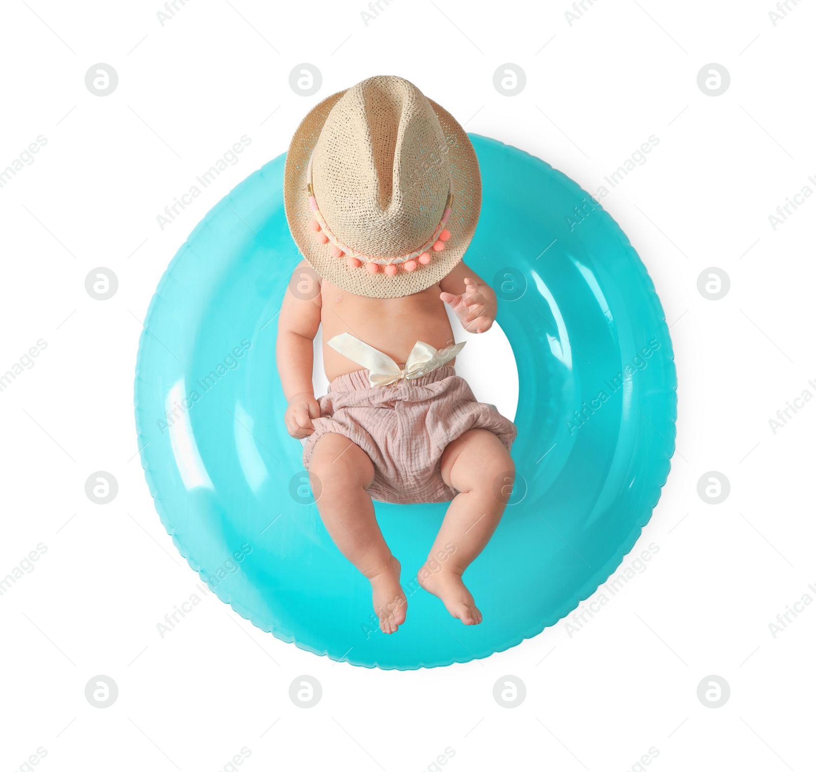 Photo of Cute little baby in hat with inflatable ring on white background, top view