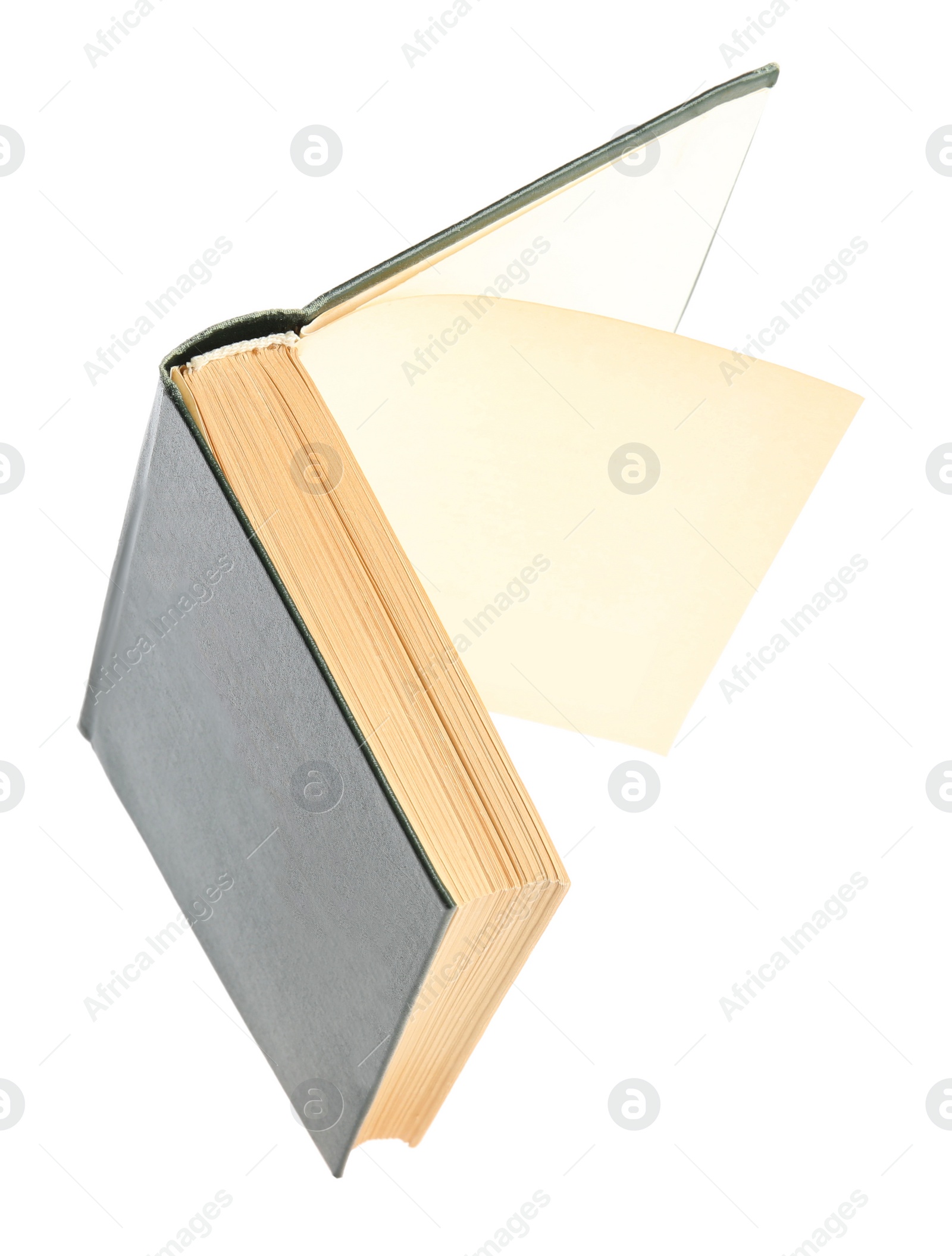 Photo of Open old hardcover book isolated on white