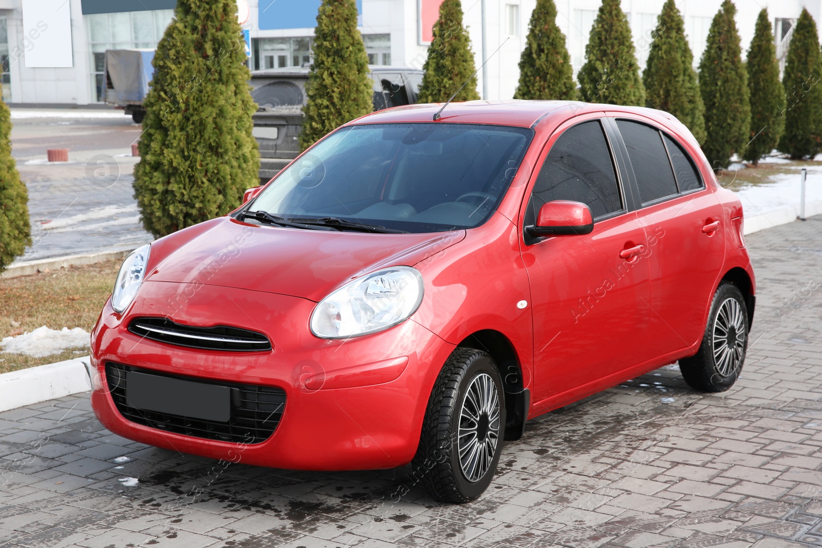 Photo of Clean automobile on city street. Car wash service