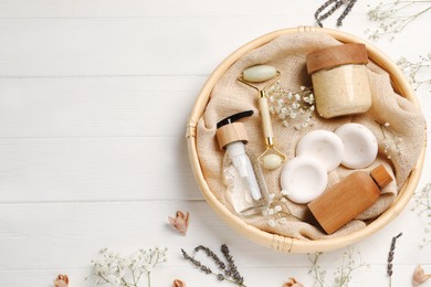 Photo of Spa gift set with personal products on white wooden table, flat lay. Space for text