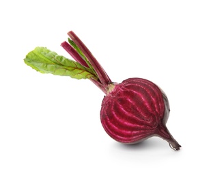 Half of fresh beet with leaves on white background