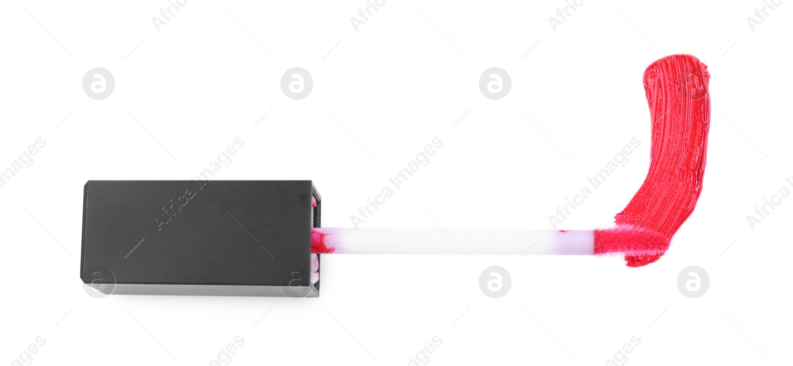 Photo of Stroke of red lip gloss and applicator isolated on white, top view