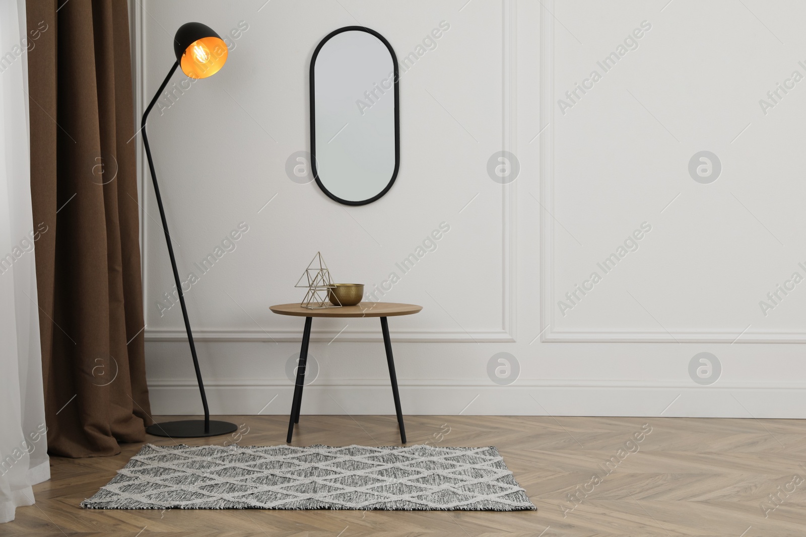 Photo of Modern living room interior with table and floor lamp