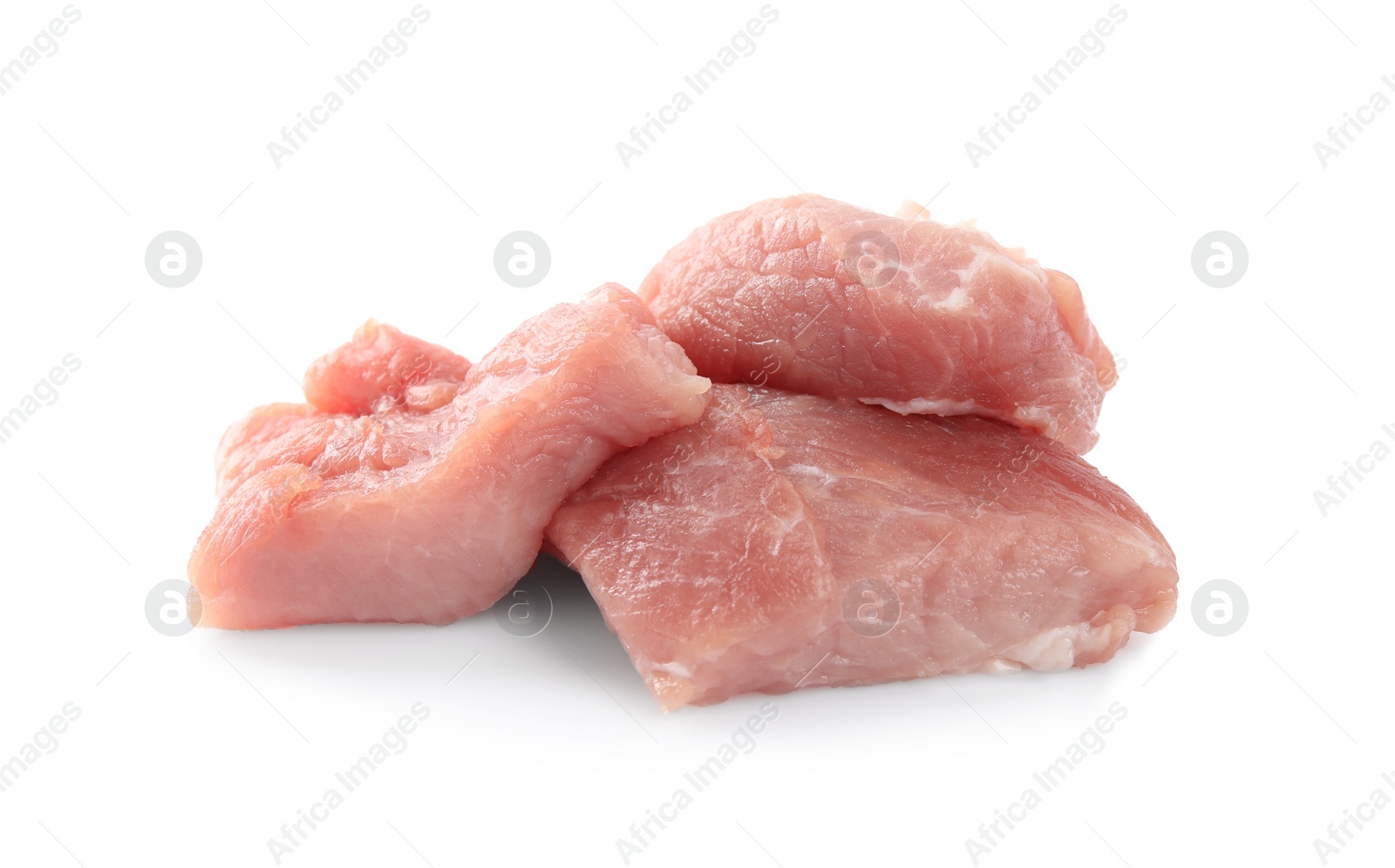 Photo of Pieces of raw meat isolated on white