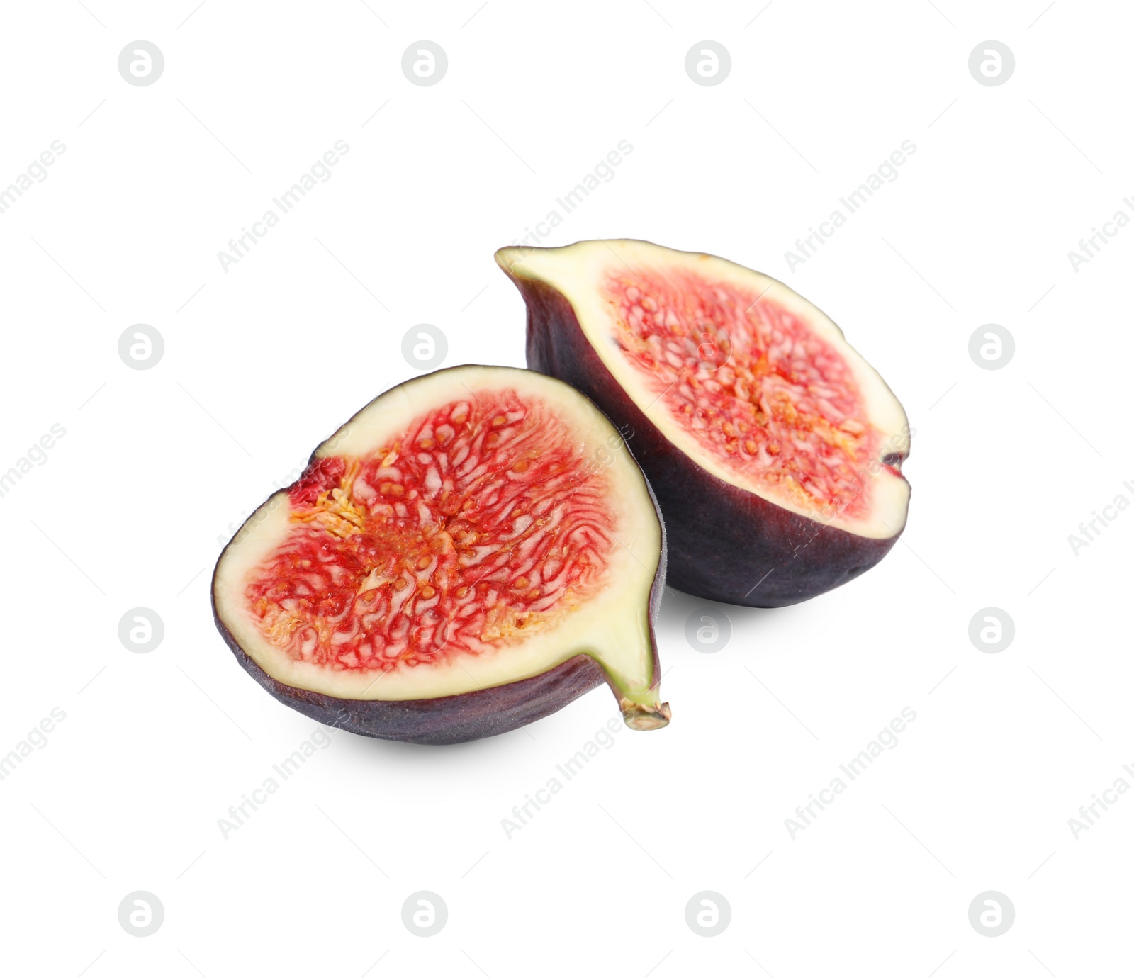 Photo of Pieces of ripe fresh fig isolated on white