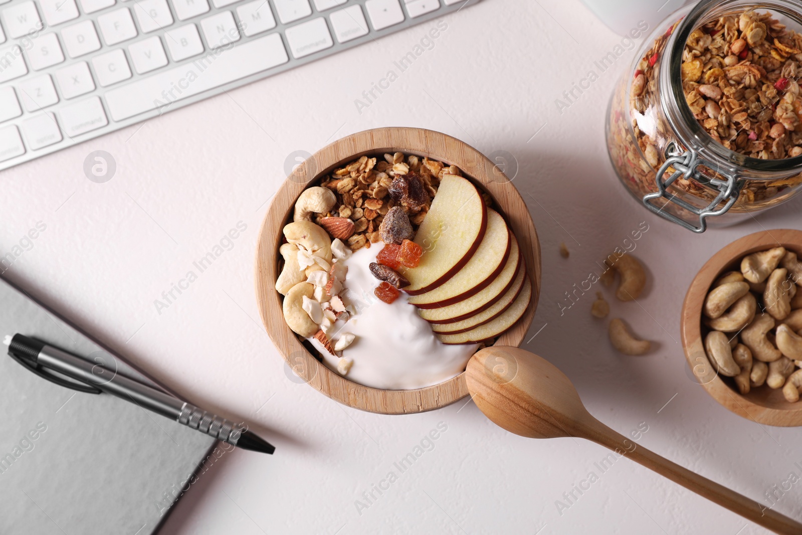 Photo of Flat lay composition with tasty granola on beige table